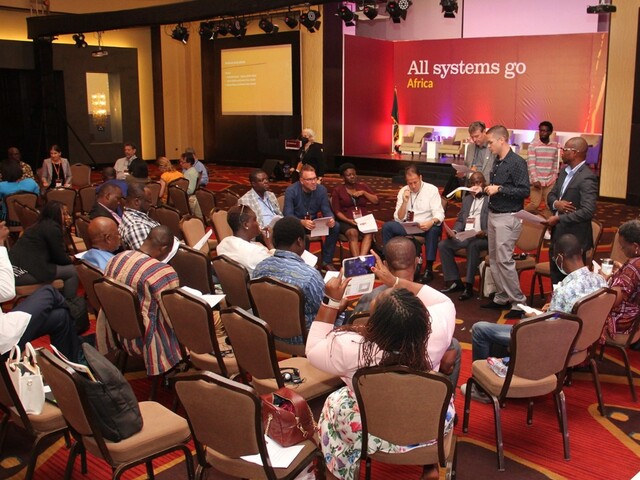 Participants engage in a breakout session during the Africa All Systems Go Symposium in Accra