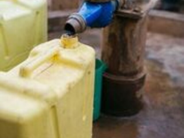 Jerrycans at pump