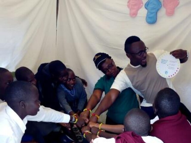 Kenyan school girls taking the pledge in past activitiy