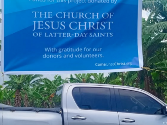Banner showing LDS support for WASH facilities in Uganda