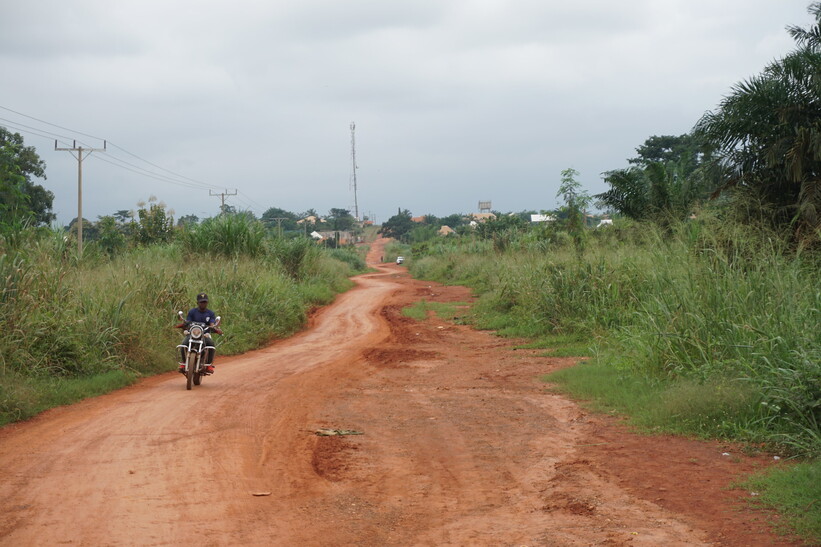 Motor driving an unpaved road in Asutifi North district in Ghana