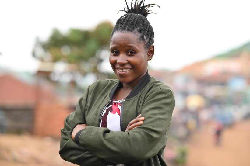 Grace Kansiime mobile money kiosk owner Uganda