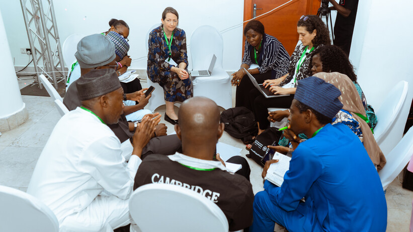 WASH Systems Learning Forum Nigeria participants in a circle discussing