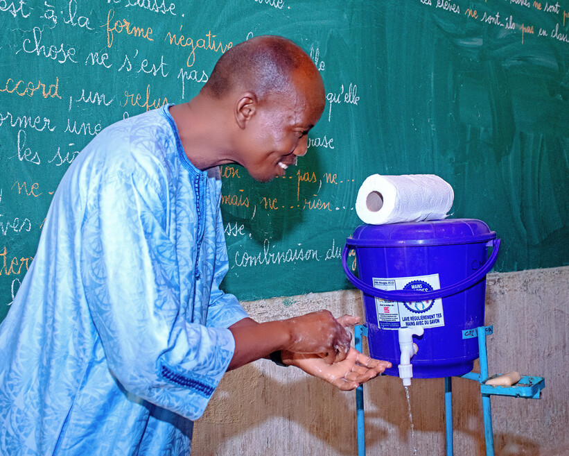 Mayor of Tenkodogo visiting a school for the municipality's annual hand-washing campaign 