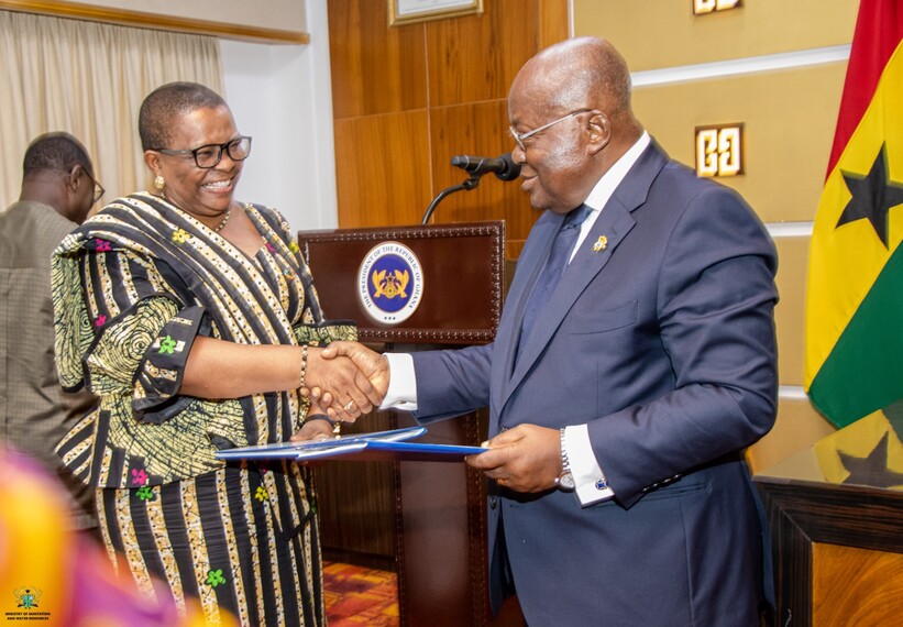 UN Representative exchanging pleasantries with the President of Ghana following the signing of the WASH compact UN Representative exchanging pleasantries with the President of Ghana following the signing of the WASH compact