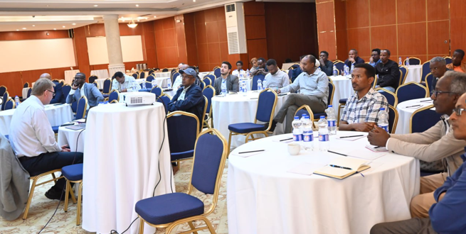 Participants attending the presentation of the research findings