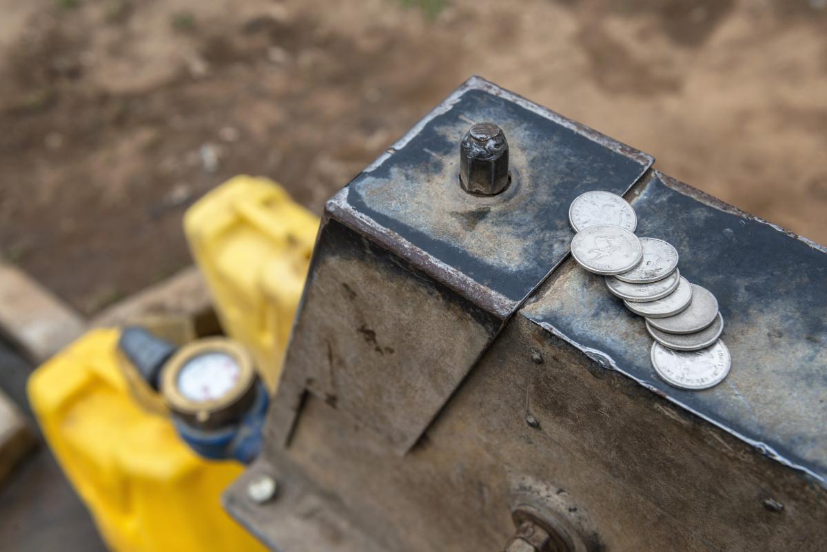 Paying for the water from the water pump