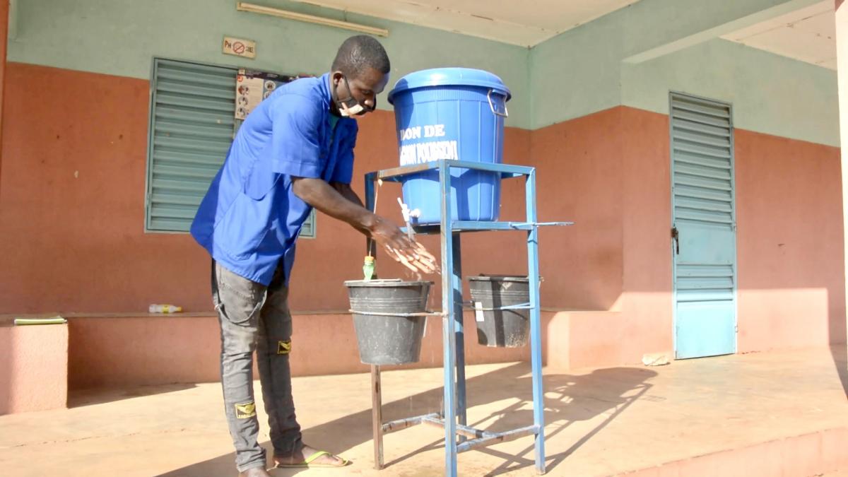 Nurse washing his hands at a health centre in Burkina Faso Nurse washing his hands at a health centre in Burkina Faso