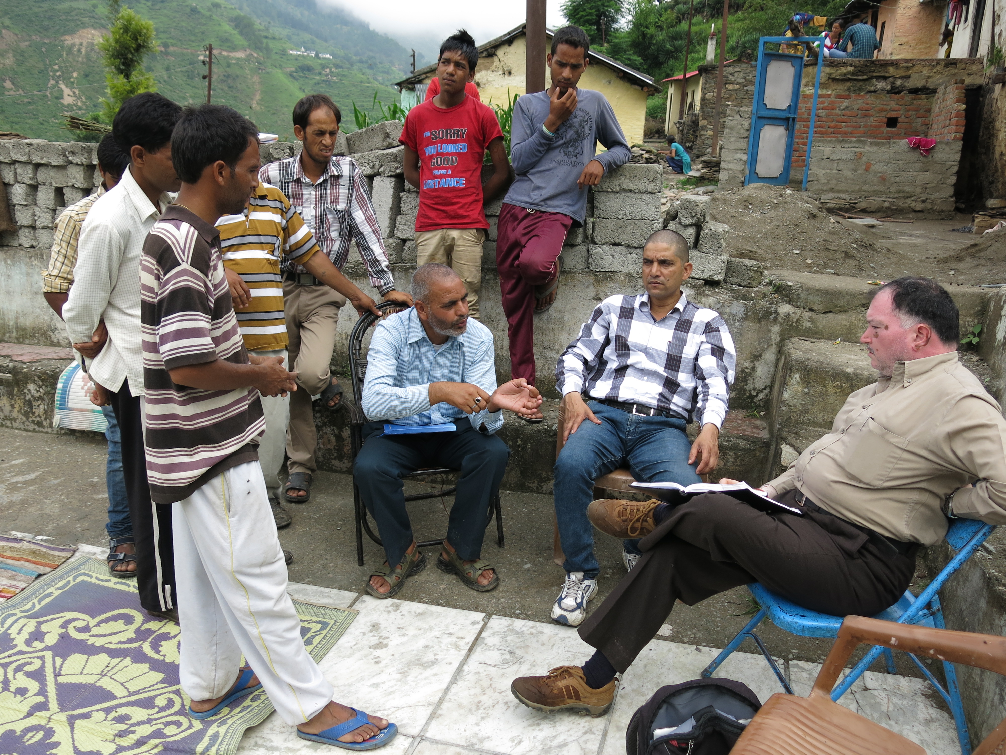 Mr Belwal explains during a village meeting