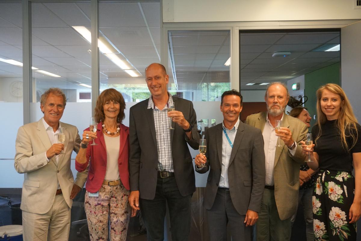 IRC and DGIS staff celebrate new partnership.