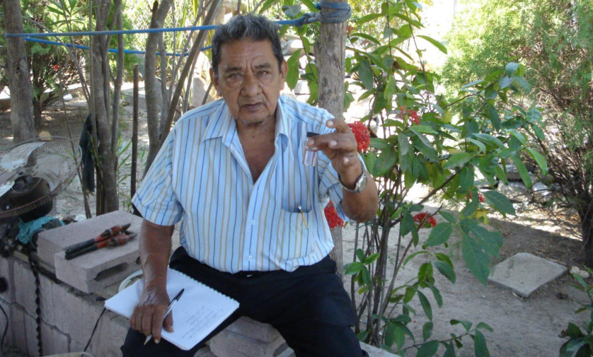 The chair of a water committee in El Salvador checks water quality. Photo: Stef Smits/IRC The chair of a water committee in El Salvador checks water quality