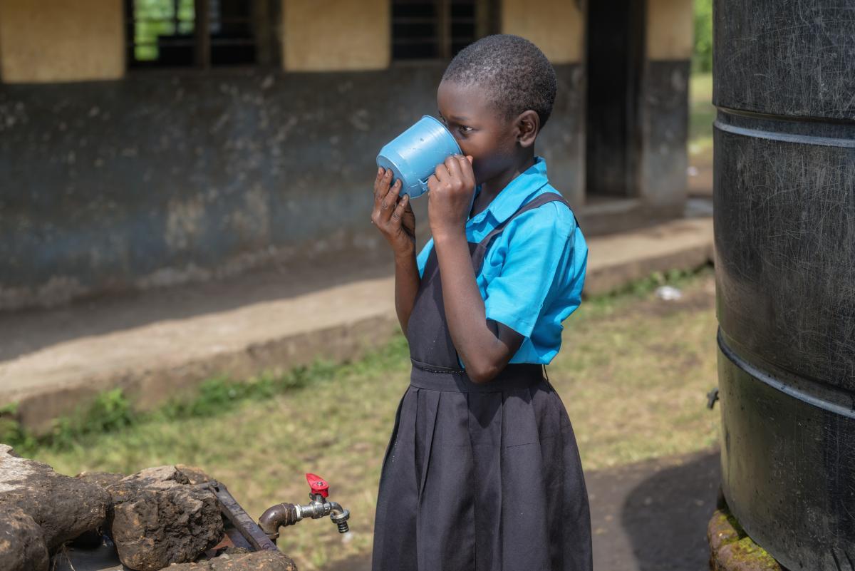 Girl drinking water in Fort Portal, Uganda (photo credits: Agenda For Change) Girl drinking water in Fort Portal, Uganda (photo credits: Agenda For Change)