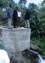 Three Chiefs proudly unveil a new catchment project that they collectively funded and implemented to serve their communities in Limbe, Cameroon Three Chiefs proudly unveil a new catchment project that they collectively funded and implemented to serve their communities in Limbe, Cameroon. Now that the catchment is developed they seek contributions from individual villages to connect to the system over several kilometres. Photographer unknown, in Limbe Cameroon.