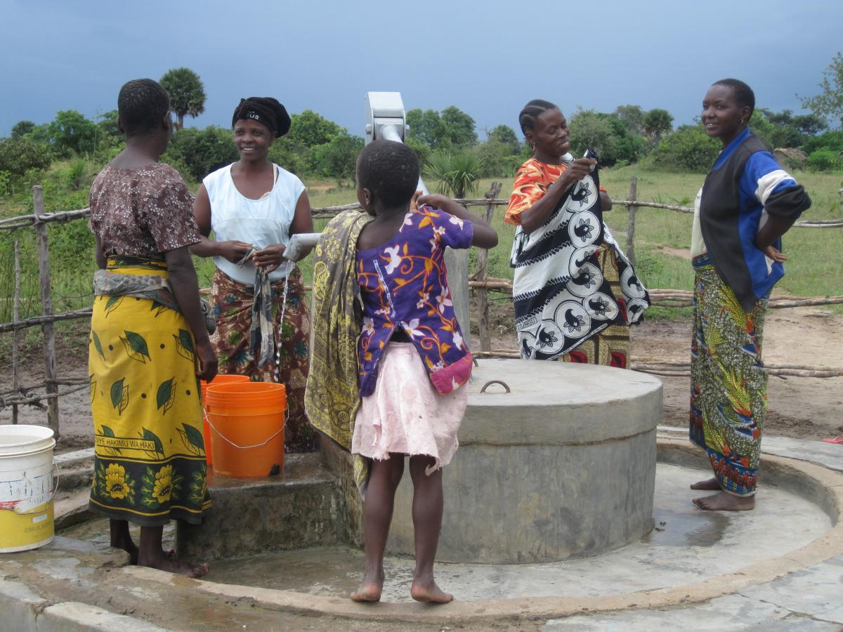People at a water point in Mwanza, Tanzania People at a water point in Mwanza, Tanzania
