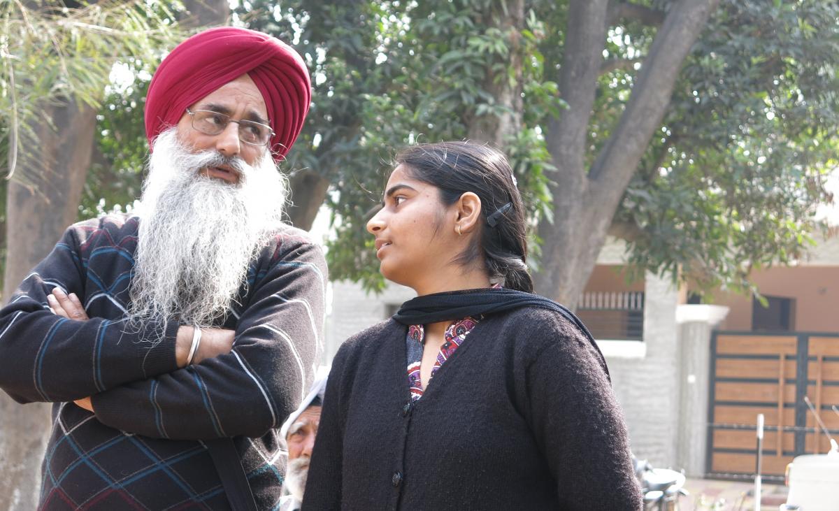  Mr Daljit Singh, Junior Engineer in charge of village water supplies in SAS Nagar District, Punjab, together with his daughter. Photo: Stef Smits/IRC