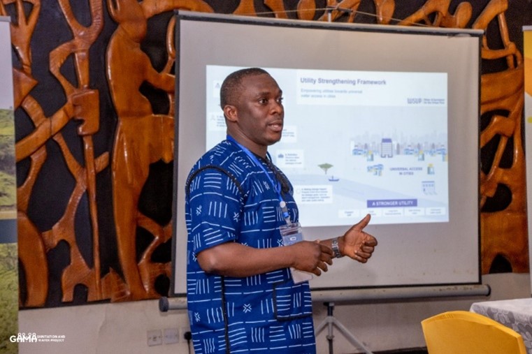 Anthony Addi speaking at the side eent