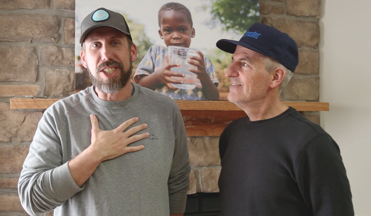 Water for Good CEO Jon Allen (l) and Lifewater International CEO (r) announce merger